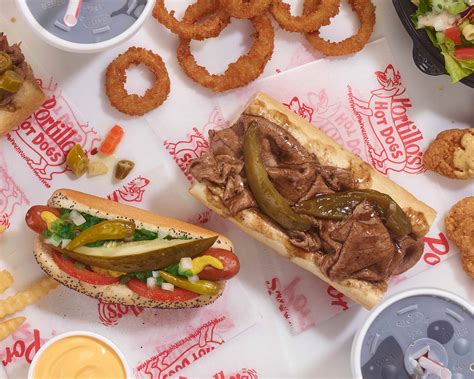 Score Big with <b>Portillo’s</b> Game Day Catering. . Portillos hot dog near me